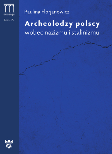 Okładka książki w kolorze kobaltowym z pękniętą ścianą.